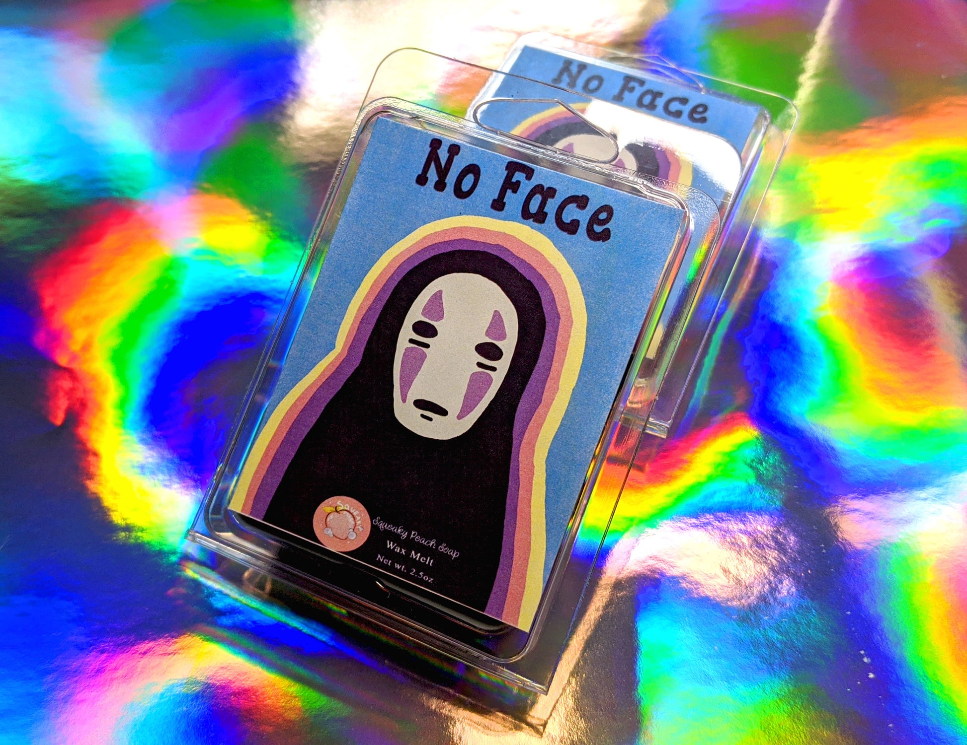 a wax melt label that pictures no face from spirited away. it reads "no face, wax melt, 3 ounces"
