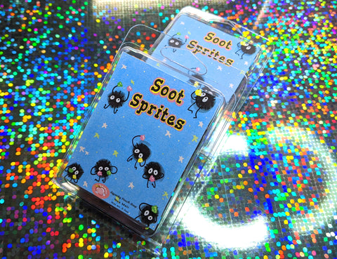 a baby blue wax melt label with soot sprites from spirited away pictured. it reads "soot sprite, wax melt, 3 ounces"